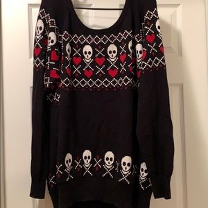 Black sweater with hearts and skulls